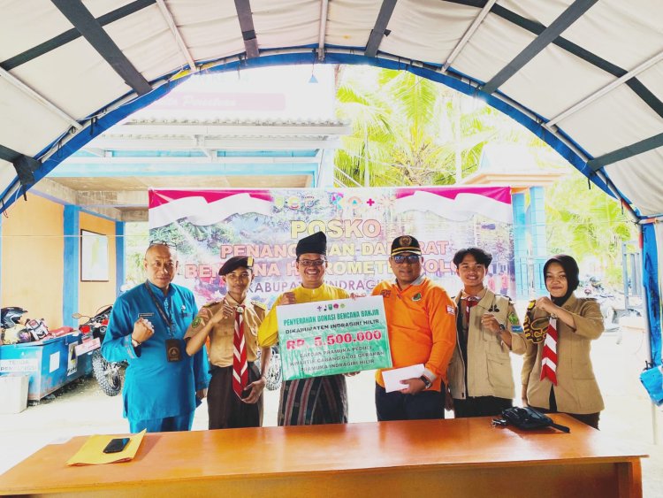 Gerakan Pramuka Peduli Inhil Memberikan Bantuan kepada Masyarakat yang Terdampak Musibah Banjir